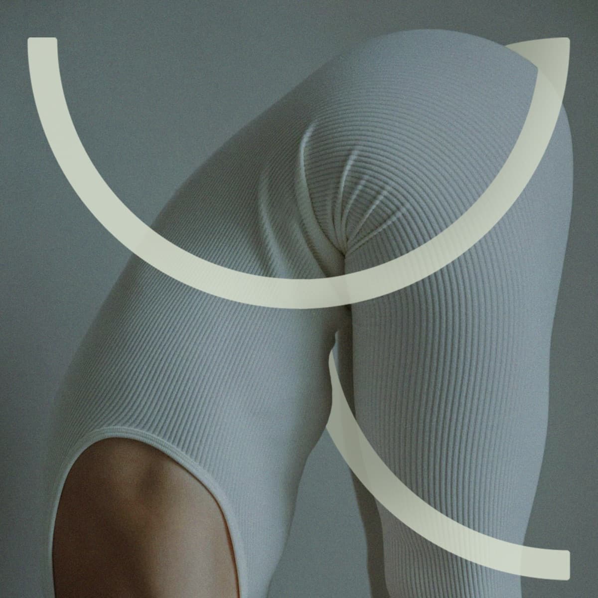 YAAD Yoga Studio: leaf logomark over a body in a soft yoga pose.
